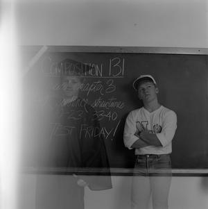 Primary view of [Hansen standing by chalk board]