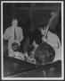 Photograph: Dr. M. E. (Gene) Hall directs an early lab band