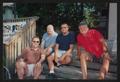 Photograph: [4 people sitting on deck stairs: Lone Star Ride 2003 event photo]