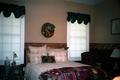 Photograph: [A bedroom at the Country Place at Cross Roads, 1]