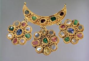 Primary view of Crescent shaped necklace with pendants set with semi precious stones