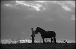 Primary view of [A man and a horse on a hill, 12]