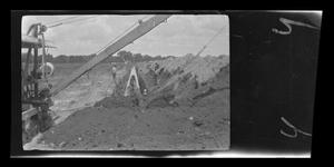 Primary view of [Photo of men working on a pipeline]