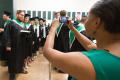 Photograph: [Students backstage at Commencement]